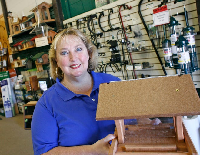 Pam French owns Wild Birds Unlimited in Hanover with her husband, Steve. The shop, which is on Route 53, specializes in birdhouses, bird feeders and feed. The photo was taken on Tuesday Sept. 11, 2012.