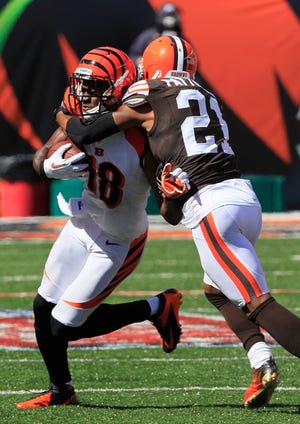 Cincinnati Bengals wide receiver A.J. Green (18) in action against Cleveland Browns cornerback Dimitri Patterson (21).