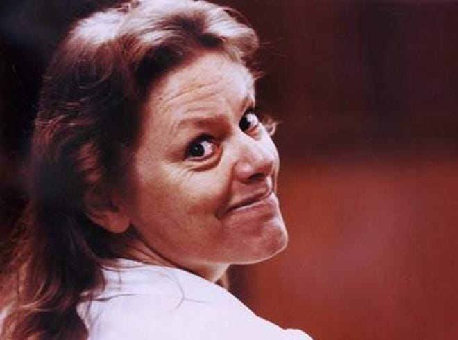 Aileen Wuornos smiles during her 1992 murder trial.