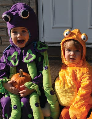 These two are all dressed up and ready for tick or treating.