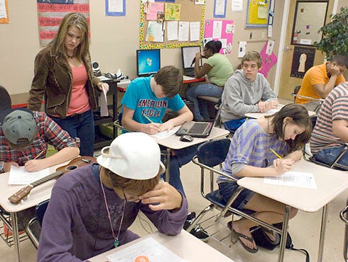 Students do classwork at a Choice High School English class in this 2012 file photo.