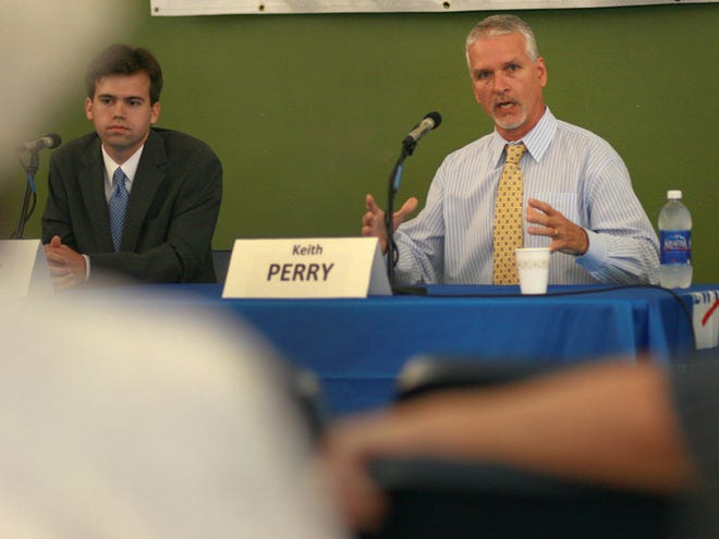 Andrew Morey, left, and Keith Perry participate in the League of Women Voters Candidate Forum on Sept. 29 at theTrinity United Methodist Church Youth Building.