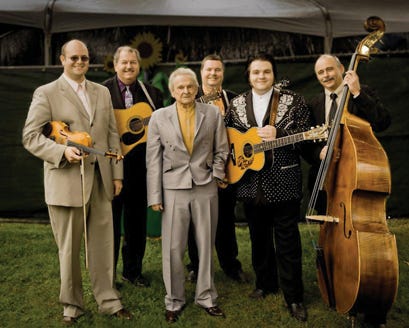 Dr. Ralph Stanley, third from left, is shown with his Clinch Mountain Boys. From left are Dewey Brown III, James Shelton, Mitchell Van Dyke, Nathan Stanley and Jimmy Cameron. The band performs at 9 p.m. Friday at the Lil John’s Fall Bluegrass Festival in Snow Camp.
