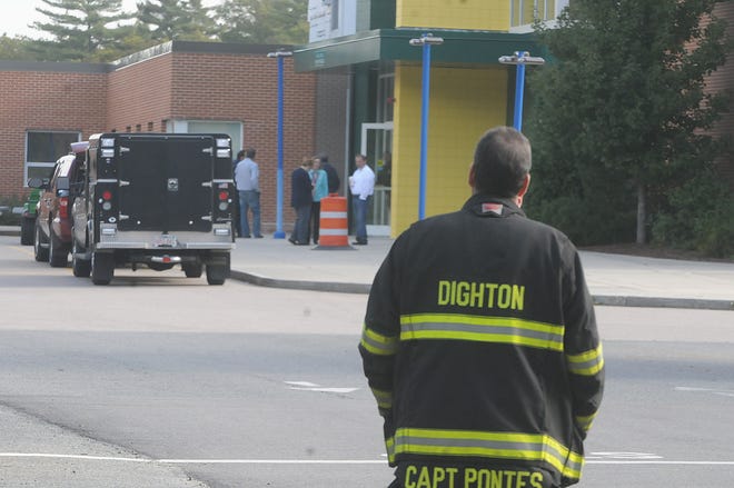 Dighton fire and police personnel on the scene at Dighton-Rehoboth Regional High School with the State Police Bomb Squad after a bomb threat was discovered in a note at the beginning of the school day. Taunton Gazette| Mike Gay