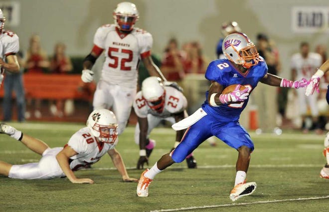 Bob.Self@jacksonville.com Bolles' Arterrious Mitchell (2) makes a run to the 1-yard line during the third quarter against Baker County.