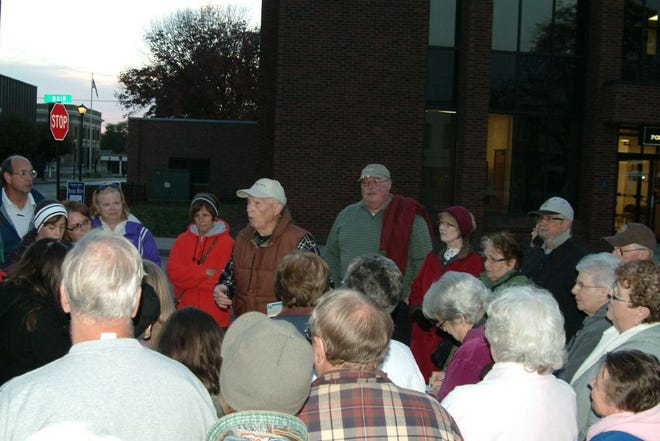 Ray Cleer explains some of the history of downtown Canton during an Architectural Walk Friday as part of the 2012 Spoon River Reads program.