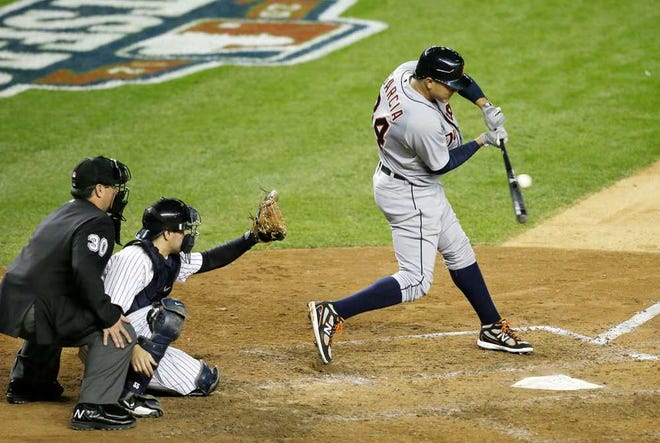 Detroit's Avisail Garcia hits a run-scoring single during Game 2 of the American League Championship Series against the New York Yankees on Sunday in New York. The Tigers won, 3-0.