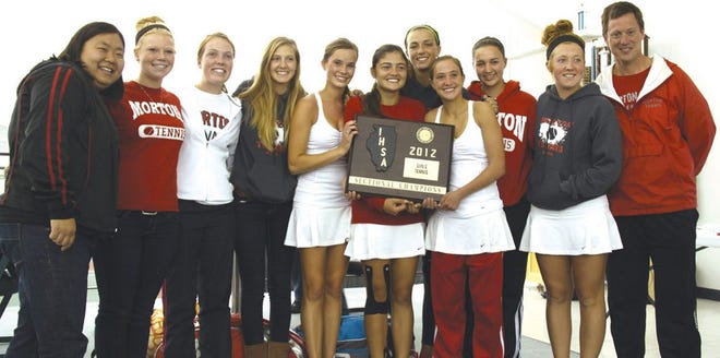 The Morton girls tennis team won the Bloomington Sectional championship Saturday. Members of the squad with the first-place plaque, the program's second in the last four years, are, from left: assistant coach Molly Thompson, Emma Zern, Katie Shaw, Madie Kraft, Mariah Thompson, Gaya Nersesyan, Kate Byrne, Julie Martin, Rachel Scherer, Hannah Bailey and head coach Pete Martin. Not pictured is Amy Nguyen.
