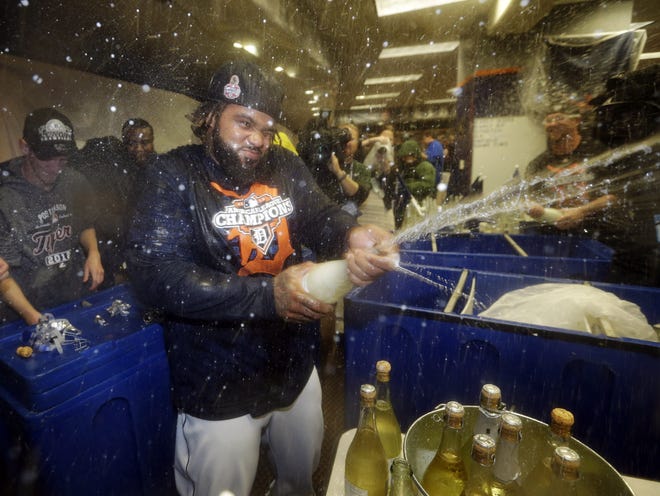 Detroit Tigers' Prince Fielder celebrates in the locker room after his team won Game 4 of the American League championship series 8-1, against the New York Yankees, Thursday, Oct. 18, 2012, in Detroit. The Tigers move on to the World Series. (AP Photo/Paul Sancya )
