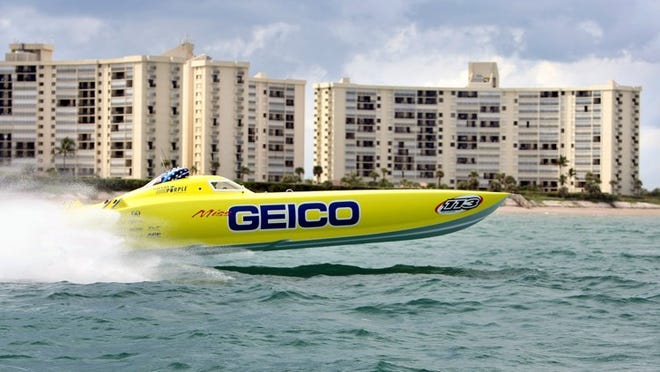 Miss Geico, a 50 ft. long powerboat based out of West Palm Beach in action during a trial Thursday before the weekend race of Jupiter. The boat is one of forty boats taking part in the race. (Bill Ingram/Palm Beach Post)