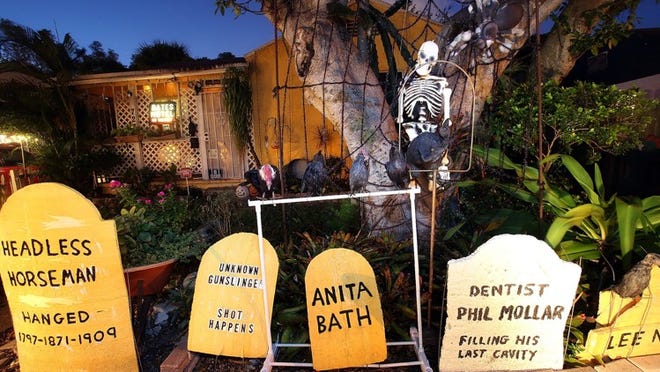 Joe and Cathy Egan have been creating a crowd-pleasing Halloween display at their home for 18 years. “We get mobs every year,” said Joe. “We add to it and change it around and work on it all year.”