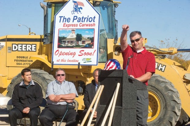 Pueblo builder Dan Carlson on Thursday morning addresses a groundbreaking celebration for The Patriot Express retail center. The addition to the Regency Square Shopping Center on Pueblo's South Side will feature an express carwash and stores.
