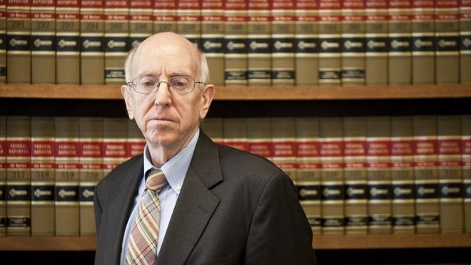 Judge Richard Posner, a federal appellate judge, says the standards for granting patents are too loose. Some tech firms now spend more on patent lawsuits and purchases than on product development.