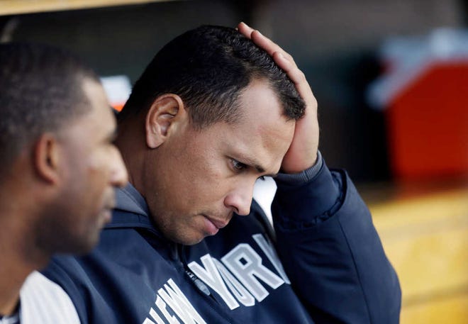New York Yankees' Alex Rodriguez watches from the bench during Game 4 of the American League Championship Series against the Detroit Tigers on Thursday in Detroit. After leading the league in wins this year, the Yankees were swept by the Tigers in the series.