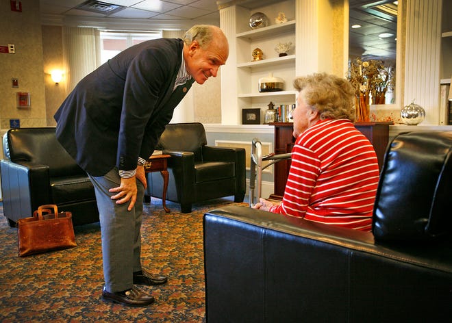 Congressman William Keating talks with Anna Lene, 95, at Life Care Center of Plymouth on Thursday, Oct. 11, 2012.