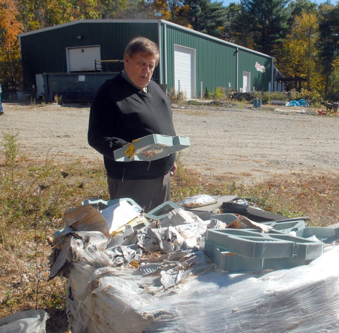 Killingly Town Manager Bruce Chimento shows the debris that had to be cleaned up at the DRI building near the town's landfill that will be used to store machinery over the winter.