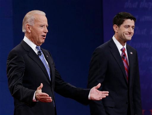 Vice President Joe Biden, left, and Republican vice presidential nominee Paul Ryan, of Wisconsin, greet spectators during the vice presidential debate at Centre College, Thursday, Oct. 11, 2012, in Danville, Ky. (AP Photo/Eric Gay)