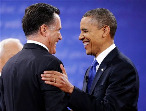 Republican presidential nominee Mitt Romney, left is greeted by President Barack Obama before the start of the third presidential debate at Lynn University on Monday in Boca Raton, Fla.
