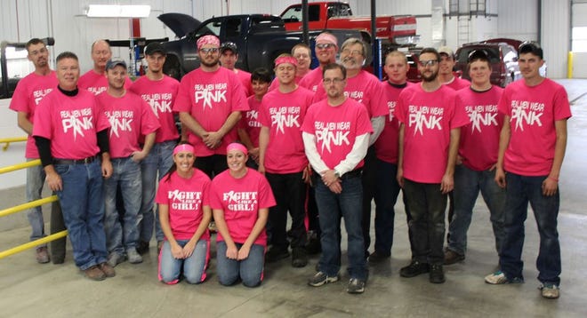 The staff at the Lake Chevrolet GM Auto Center went all out last week to bring awareness to Breast Cancer Awareness Month - October - by wearing pink all day on the job.