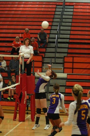 Canton's Sarah Linder keeps her eyes on the ball as she prepares for a hit at the net in the Lady Giants' regional game against Limestone Tuesday night. Linder and the rest of the Lady Giants had their season end with a 25-8, 25-9 loss to the Lady Rockets.