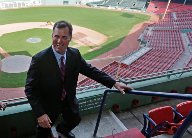 New Boston Red Sox manager John Farrell smiles as he walks through the stands at Fenway Park in Boston, Tuesday, Oct. 23, 2012. Farrell becomes the 46th manager in the club's 112-year history.