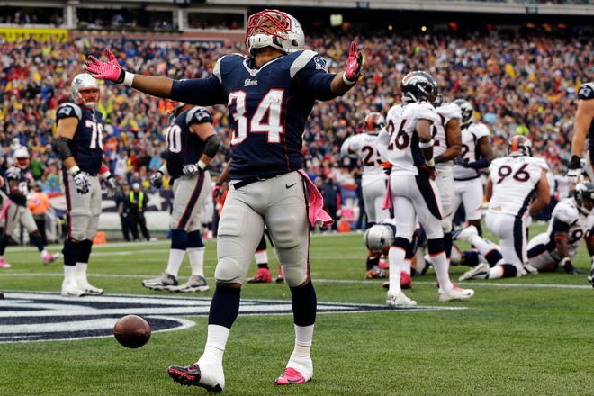 New England Patriots running back Shane Vereen (34) celebrates his touchdown against the Denver Broncos in the second quarter of an NFL football game, Sunday, Oct. 7, 2012, in Foxborough, Mass. (AP Photo/Elise Amendola)