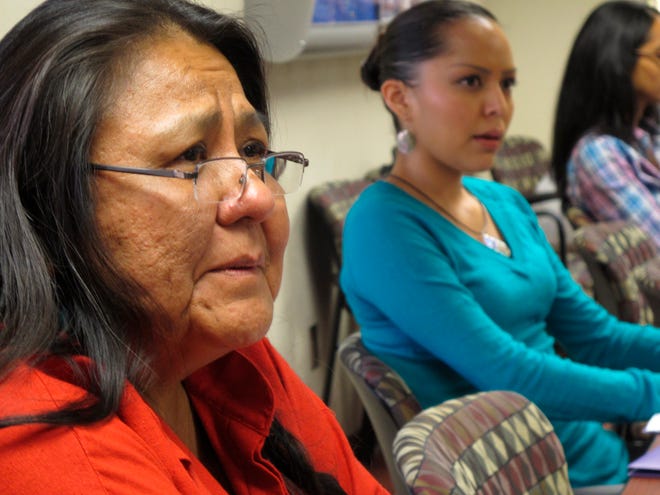 In this Oct. 19 photo, activist Donna House, 58, of Ohkay Owingeh Pueblo, left, participates in a forum on access for American Indian women getting emergency contraceptive Plan B, in Albuquerque. The federal Indian Health Services has said it is finalizing a policy to make Plan B available to American Indian women at its facilities much like it is in retail pharmacies across the country - without requiring a consultation with a health care provider and without a prescription, except for those under 17.