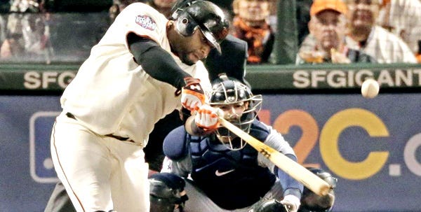 San Francisco Giants' Pablo Sandoval connects for one of his three home runs in Game 1 of the World Series against the Detroit Tigers on Wednesday night. The Giants won the game, 8-3.