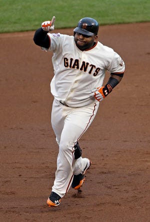 Giants third baseman Pablo Sandoval hit three home runs in Game 1 of the World Series on Wednesday.