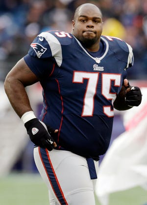 Patriots defensive tackle Vince Wilfork runs to the sidelines after the coin toss at a game against the Broncos at Gillette Stadium in Foxboro.