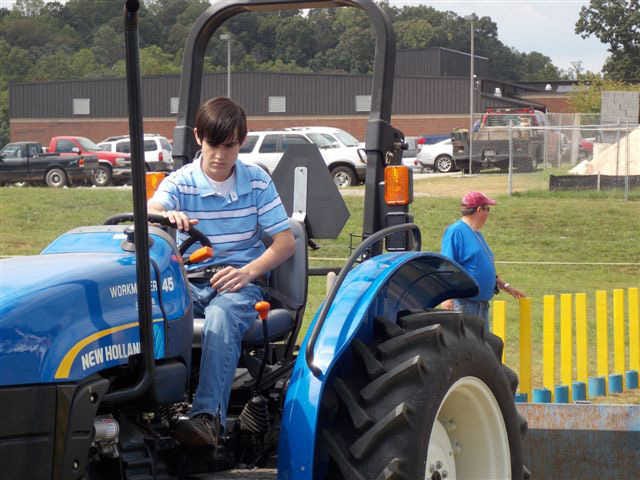 Winder-Barrow FFA member Caleb Lee recently competed in the Area II FFA Agricultural Tractor and Machinery Operations and Maintenance Career Development event held Sept. 11 at Banks County High School in Homer. The event allows students to demonstrate the skills necessary to safely and efficiently operate a tractor. Participants in the event take a written exam and answer problem solving questions related to tractor servicing, safe operation, care and maintenance. Participants also drive a tractor and are tested on tractor operations. Lee is the son of Rusty and Rayna Lee of Winder. Tonia Harbin is the Winder-Barrow FFA advisor.