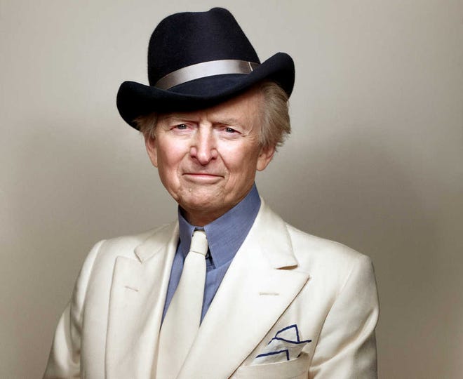 This 2012 image released by Little, Brown and Company shows author Tom Wolfe. Wolfe, who wrote "The Bonfire of the Vanities" and "The Right Stuff," returns with "Back to Blood," his first novel in eight years.