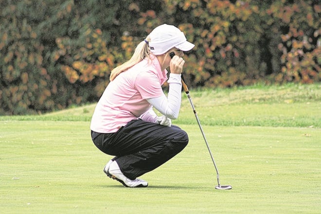 Highland Tech senior Taylor Shellman lines up the final putt of her high school career Tuesday at the 1A/2A state championships.