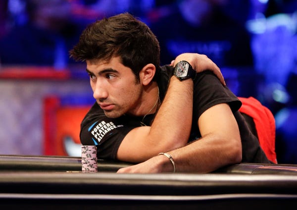 Jesse Sylvia watches play from Jake Balsiger on an all-in bet during the World Series of Poker Final Table event, early Wednesday, Oct. 31, 2012, in Las Vegas.