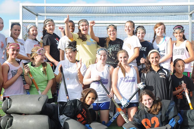 Oliver Ames field hockey players strike a pose during their practice on Tuesday in Easton.