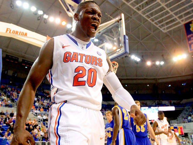 Florida Gators freshman guard Michael Frazier II celebrates making a shot and getting fouled against the Nebraska-Kearney Lopers at the Stephen C. O'Connell Center on Thursday in Gainesville. Florida defeated Nebraska-Kearney 101-71.