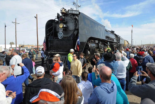 Hundreds of people gather to take a look at Union Pacific steam locomotive No. 844 Saturday during a stop in Amarillo.