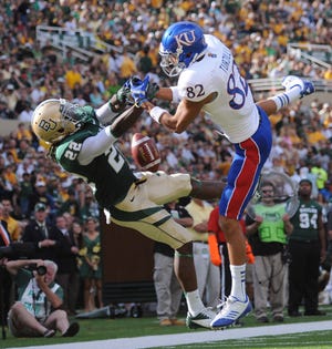 Baylor cornerback Joe Williams, left, breaks up a pass intended for Kansas wide receiver Andrew Turzilli during the first half Saturday in Waco, Texas. The Jayhawks lost 41-14.