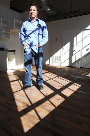 Michael J. Kiley, owner of Quincy-based Heritage Companies Inc., stands in a unit at the Star Mill Lofts on East Main Street in Middleboro. Kiley is renovating the old mill into condos and commercial space.