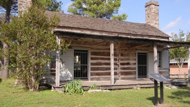 The Abraham Alley log cabin is among the attractions in the historic district of Columbus, where the Folk Fest takes place in November.