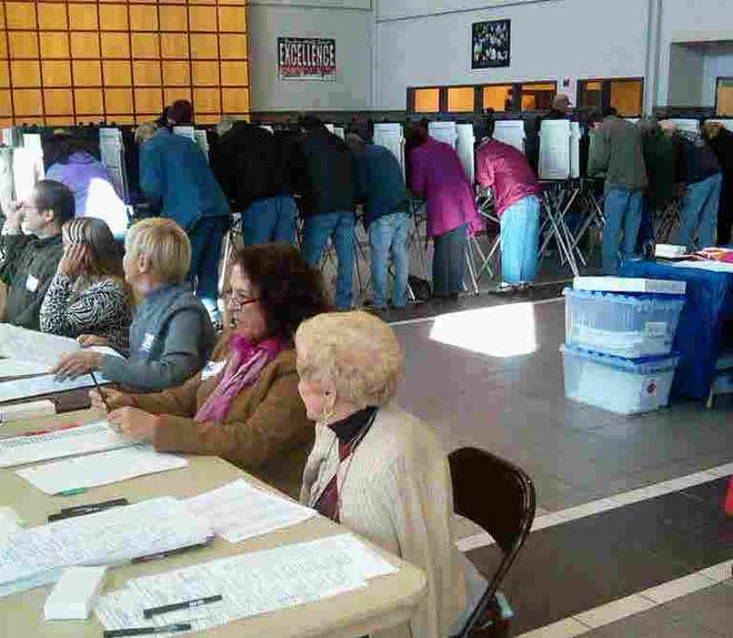 Voters pack the polling booths at the Rayham Middle School for the presidential election on Tusday, Nov. 6, 2012.