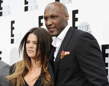 Lamar Odom and Khloe Kardashian at Hollywood event last year announcing their new reality TV show (AP photo)
