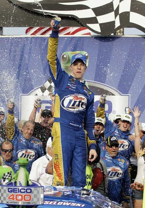 Nam Y. Huh Associated Press Brad Keselowski celebrates in Victory Lane with his crew after winning the race at Chicagoland Speedway in Joliet, Ill., on Sept. 16.