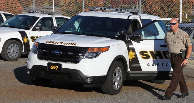Gaston County Sheriff’s deputy Sgt. M. Carson is shown with a Ford Explorer Interceptor recently. The Gaston and Lincoln County Sheriff’s departments each have one of the new vehicles to test as a possible replacement for the Ford Crown Victoria, which is not being made anymore.