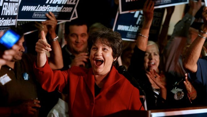 West Palm Beach -- Former West Palm Beach Mayor Lois Frankel takes the stage after winning the U.S. Representative for Florida District 22 election against Adam Hasner at the Democratic Party election night celebration at the Embassy Suites in West Palm Beach on Tuesday. (Gary Coronado/The Palm Beach Post)