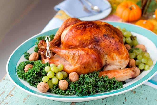Plain Jane turkey is easy to cook, and it packs a lot of flavor. Serve it with plain Jane
gravy. (The Associated Press)