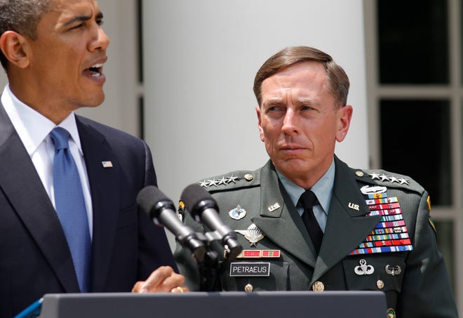 President Barack Obama, accompanied by Gen. David Petraeus, announces in the Rose Garden of the White House in Washington, Wednesday, June 23, 2010, that Petraeus would replace Gen. Stanley A. McChrystal, the commander of Western forces in Afghanistan, and his replacement.