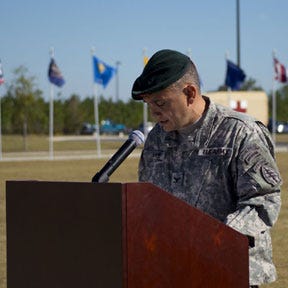 121101-A-GV361-002 – Col. Miguel D. Howe, 7th Special Forces Group (Airborne) Deputy Commander, gives his remarks during a Change of Command ceremony on Nov. 01 on the 7th SFG (A)'s Meadows Parade Field. Lt. Col. Richard R. Navarro Jr. relinquished command of the 2nd Battalion, 7th Special Forces Group (Airborne) to Lt. Col. Ronald P. Fitch Jr. during a traditional Army Change of Command ceremony.