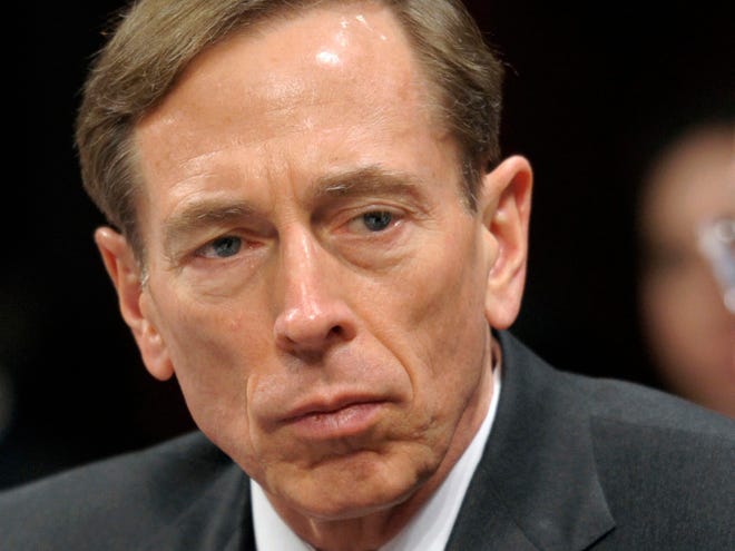 This Feb. 2, 2012 file photo shows CIA Director David Petraeus testifying on Capitol Hill in Washington. Petraeus has resigned because of an extramarital affair. (AP Photo/Cliff Owen, File)