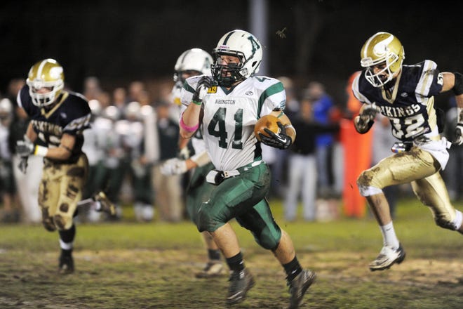 Abington's Jack Malafronte, center, runs for 61 yards in the second quarter on this play during their game on Friday, Nov. 9, 2012 in East Bridgewater.